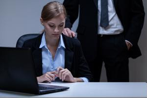 A female employee is harassed by a colleague.