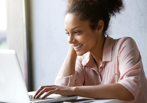 woman looking at computer